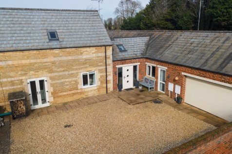 A driveway providing parking but also a courtyard