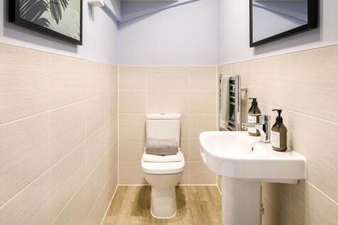 A guest cloakroom completes the home