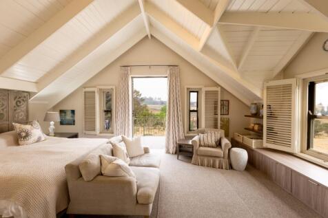 Main bedroom with balcony  views