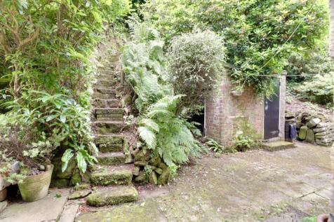 Open rear courtyard with steps to viewing deck