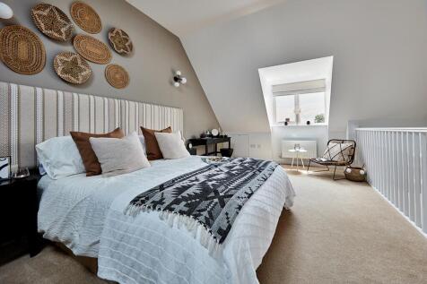 Bedroom 1 occupies the whole top floor, creating a private and peaceful area
