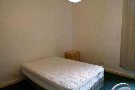 Simple furnished bedroom with a double mattress...