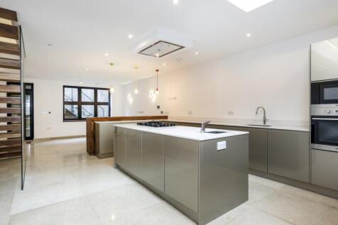 Set across three beautifully arranged floors, this distinctive townhouse is tucked away on a peaceful residential street just half a mile from Earlsfield Station. Finished to a high standard throughou