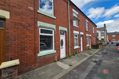 Spacious two-bedroom terraced home near Failsworth Metrolink Station, offering a modern kitchen, large living room, two bedrooms, stylish bathroom, rear garden, and on-street parking in a convenient,