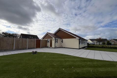 Discover the charm of this beautifully renovated semi-detached bungalow, ideally situated in the heart of Freshfield. Combining modern comfort with thoughtful design, this home offers an inviting and