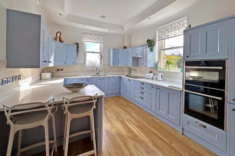 Sun-filled kitchen with appliances