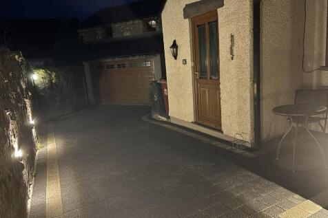 Driveway lit up s...