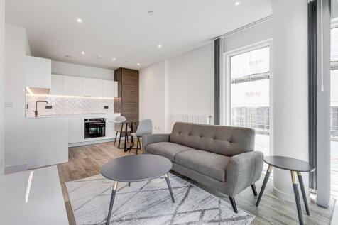 Large private balcony and a bright open-plan layout. Approx 463 sq ft one-bedroom apartment on the 3rd floor at Quill House, Kidbrooke Village SE3, floor-to-ceiling windows, double bedroom with built-