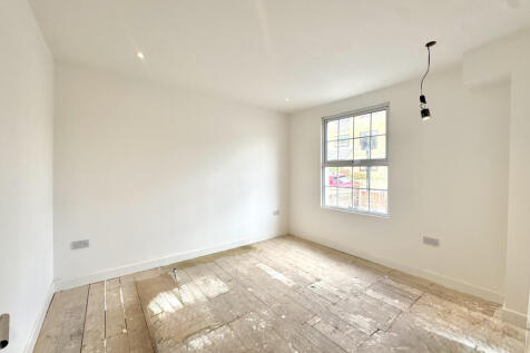 Experience the epitome of modern living in this stunning four-bedroom, two-bathroom terraced house on Heath Road, Hounslow. With excellent transport links, proximity to schools, supermarkets, and a ra