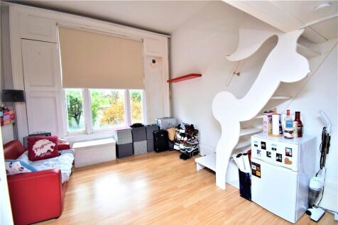 A stylish furnished double room with a unique mezzanine sleeping area, thoughtfully designed to create a separate living and sleeping space, is now available in a friendly and well-maintained house sh