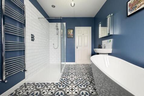 FAMILY BATH AND SHOWER ROOM