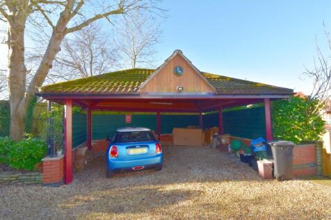 Covered parking to front.jpg