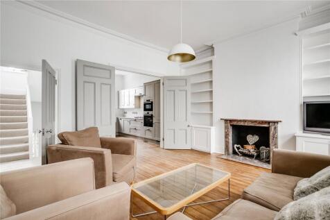 Configured across the first, second and third floors of a handsome Victorian townhouse, is this well configured three-bedroom apartment measuring 1416 Sq Ft (131.55 Sqm). With period detailing and lar