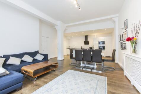 Fashionably located near St Katharine Docks, this two bedroom flat enjoys a generous interior with open-plan entertaining space with new fitted kitchen and large island/breakfast bar. Ideally placed f