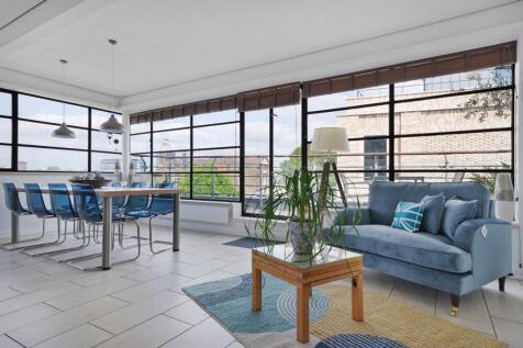 A spectacular penthouse apartment, offering in excess of 1,100 sqft of lateral space, with two spacious bedrooms, two bathrooms & impressive roof terrace directly overlooking the Regent's Canal.