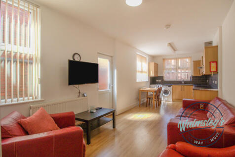 Kitchen dining & family room to rear