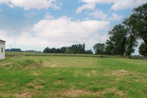 1.12 acres of flat land with defined boundaries.