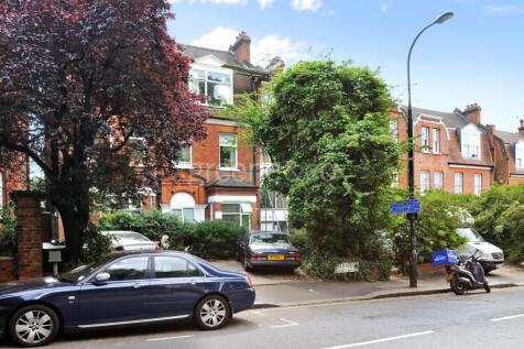 A well presented two bedroom, second floor apartment set within a handsome period building on Arkwright Road. The property comprises a bright and generously proportioned reception room, flooded with n