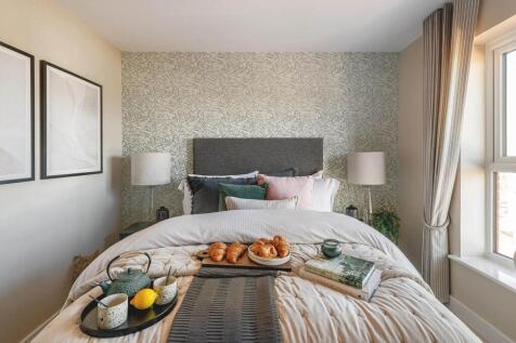 The main bedroom offers a space for you to unwind away from a busy home