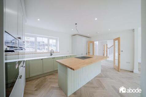 Beautiful barn style bespoke build home - THE STABLES - stunning feature staircase with open plan kitchen, dining/entertainment space that extends to a spacious lounge and features bright large bi-fol