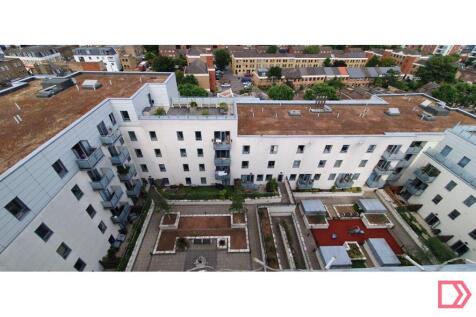 Private garden patio faces onto communal courtyard