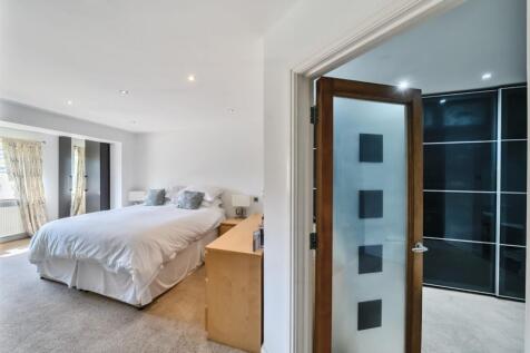 Principal Bedroom into Dressing Room