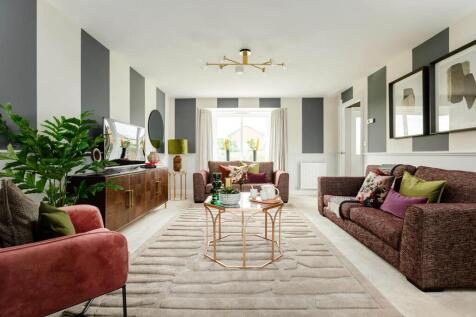 A bright and airy lounge offers a place to spend with the family