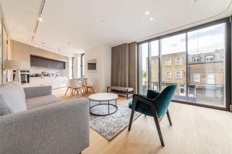Designed by the acclaimed developer Vabel, this spacious 700 sq/ft second-floor apartment blends modern luxury with high-end, bespoke furnishings. Accessible via a secure lift, the property features a