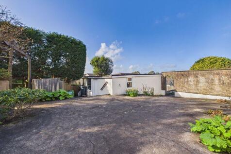 side garden, garage and parking