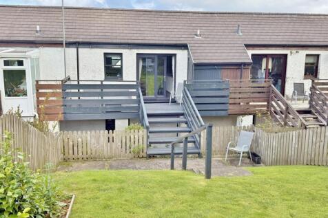 Patio doors and decking to the rear