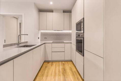 Explore this contemporary kitchen, where style meets functionality in a beautifully designed space.