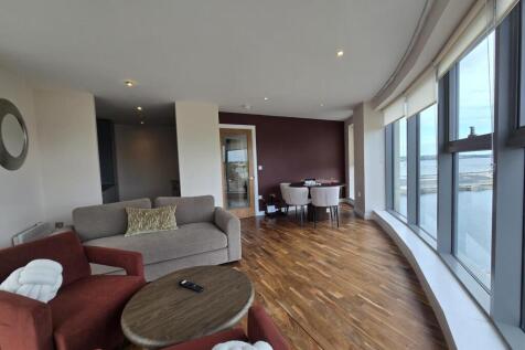 Available now! Wildheart are pleased to be able to offer this fantastic two bedroom, two bathroom furnished apartment on the 6th floor with curved living area, available for rent at The Princes Dock w