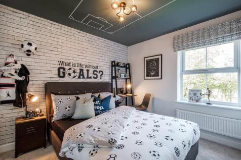 Football themed double bedroom in an Exeter home