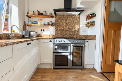 Sunlit Country Kitchen with Double Oven.png