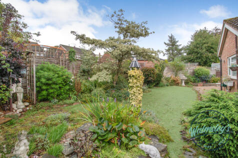 Rear gardens with pond &amp; mature borders