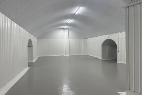 An empty arch with white lining