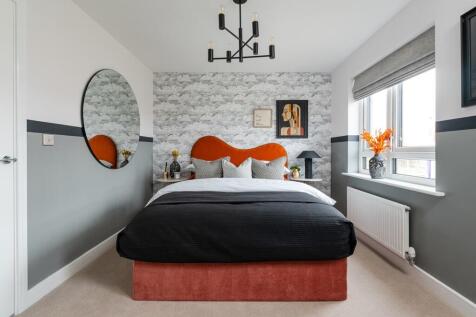 A generously sized bedroom 2
