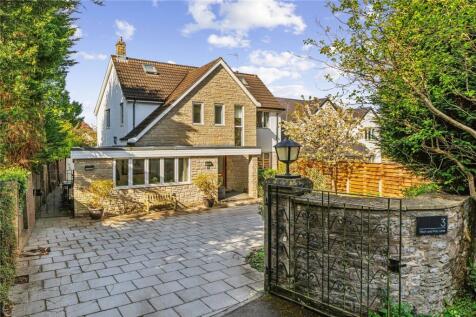 An exceedingly spacious detached family home with a glorious 85ft south west facing garden & gated off-street parking.
