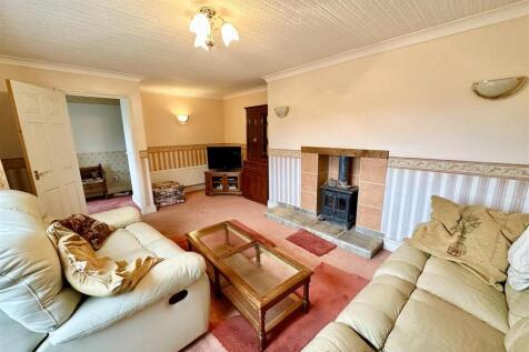 lounge with wood burning stove.jpg