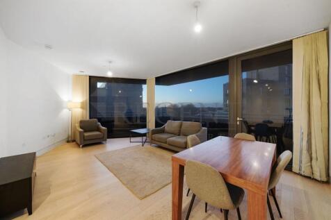 Regent are proud to present this spectacular two-bedroom apartment located in one of the two iconic hexagonal Towers. Would you prefer to communicate on WeChat? Add us at RegentLettings. The flat prov