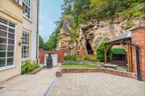 Rear Garden with stunning views of the dramatic rockface