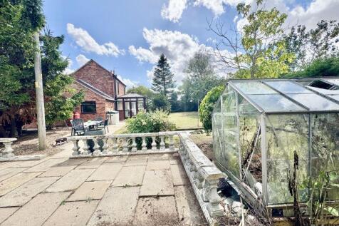 Patio and greenhouse