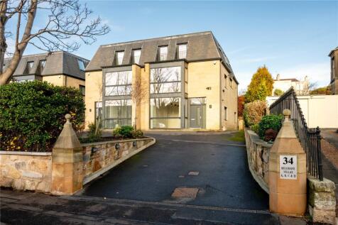An immaculate three storey townhouse offering well-proportioned family accommodation with private garden and parking.
