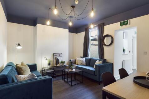 A spacious and stylish modern living room, perf...