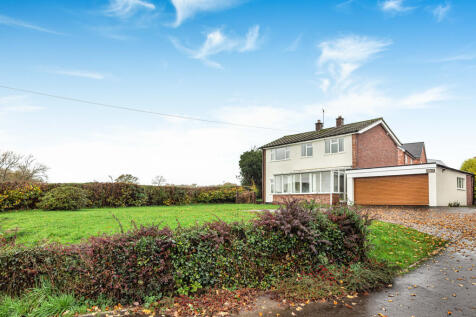 FRONT ELEVATION AND GARDEN