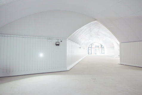 An empty arch with white lining