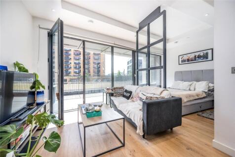 Discover this exceptional 409 sq ft studio flat in Corson House, boasting a private southwest terrace and unparalleled amenities, just 0.1 miles from Canning Town Station.