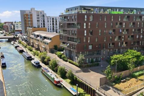 Set within a sought-after canalside development beside the historic Limehouse Cut, this bright and well-proportioned one-bedroom apartment offers modern living in a convenient East London location.