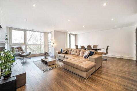 A vast 1173sqft/109sqm modern apartment by Greenland Dock. Situated on quiet residential street, within easy reach of the stations. It boasts floor-to-ceiling glazing, a balcony, an open-plan receptio