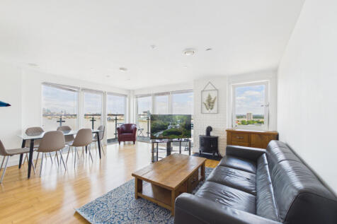Truepennys are delighted to present this attractive 12th-floor apartment set within a desirable riverside development in Woolwich. Comprising two double bedrooms, two bathrooms, and large open-plan re